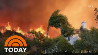 Firefighters race to contain LA wildfires before winds pick up again