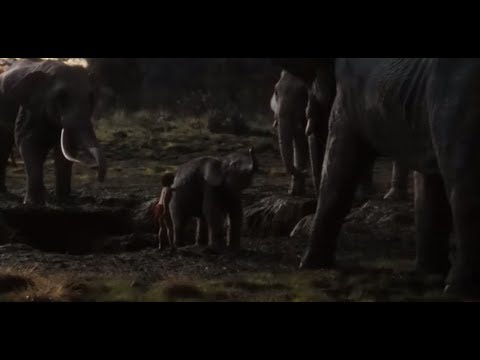 Mowgli saves the baby elephant scene, from The Jungle Book (2016)