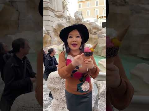 Eating gelato in front of Trevi Fountain in Rome, Italy!