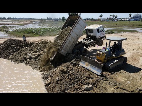 Expertise, Pond Filling Process Bulldozer Pushing Rock Stone & Soil Moving To Water Komatsu D60P